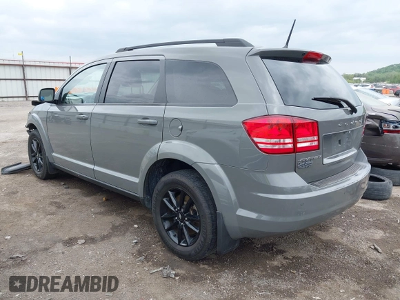2020 Dodge Journey SE Value with VIN 3C4PDCAB0LT253914, listed as a IAAI auction lot 42064609 with 65,667 mi miles and . Bid and sale history available at carsss.com. Image 3.