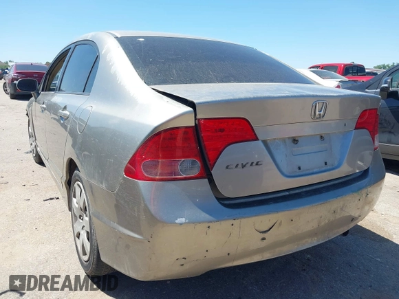 2006 Honda Civic LX with VIN 1HGFA16536L101302, listed as a IAAI auction lot 41981821 with Not provided miles and . Bid and sale history available at DreamBid. Image 3.