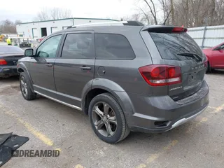 2015 Dodge Journey Crossroad with VIN 3C4PDCGB0FT639390, listed as a IAAI auction lot 41881370 with 164,219 mi miles and . Bid and sale history available at DreamBid. Image 3.