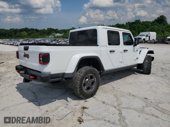 2021 Jeep Gladiator Rubicon z VIN 1C6JJTBG0ML624275, wystawiony jako Copart lot #62840275 z przebiegiem Nie podano mil oraz Szkoda całkowita • Salvage title. Historia ofert i sprzedaży dostępna na DreamBid. Obrazek 3.