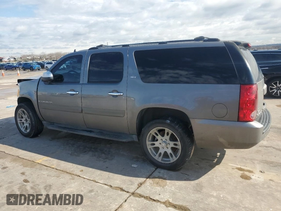2007 GMC Yukon XL SLT with VIN 1GKFC16047J260991, listed as a Copart auction lot 43289595 with 201,627 mi miles and Salvage Title. Bid and sale history available at carsss.com. Image 2.