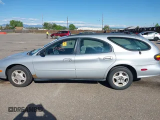 1996 Ford Taurus GL z VIN 1FALP57U9TG184497, wystawiony jako IAAI lot #42290105 z przebiegiem 149 155 mil mil oraz . Historia ofert i sprzedaży dostępna na DreamBid. Obrazek 14.