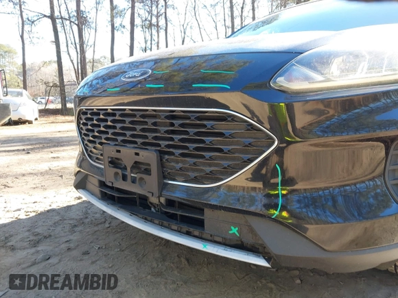 2020 Ford Escape SE z VIN 1FMCU0G6XLUA07056, wystawiony jako IAAI lot #41156940 z przebiegiem 103 707 mil mil oraz . Historia ofert i sprzedaży dostępna na DreamBid. Obrazek 19.