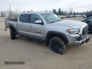 2023 Toyota Tacoma 4WD SR with VIN 3TMCZ5AN6PM608283, listed as a IAAI auction lot 41468377 with 15,046 mi miles. Bid and sale history available at carsss.com. Image 1.