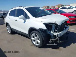 2015 Chevrolet Trax LTZ with VIN KL7CJTSBXFB236823, listed as a IAAI auction lot 42045817 with 138,930 mi miles. Bid and sale history available at carsss.com. Image 1.