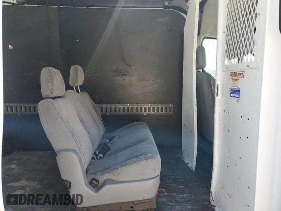 2016 Ford Transit z VIN 1FTYE2CM9GKA15884, wystawiony jako Copart lot #67927714 z przebiegiem 104 913 mil mil oraz Szkoda całkowita • Salvage title. Historia ofert i sprzedaży dostępna na DreamBid. Obrazek 11.