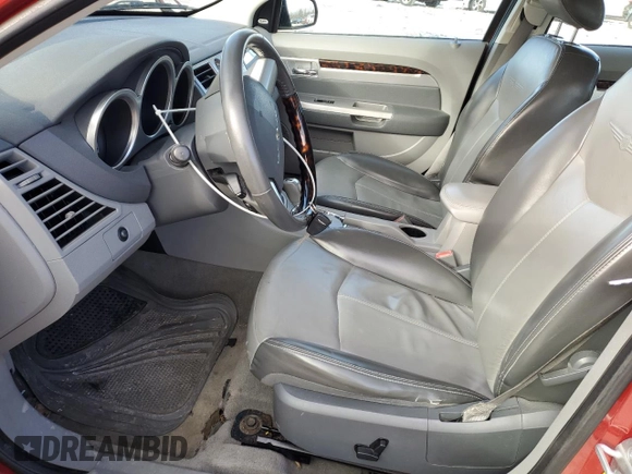 2007 Chrysler Sebring Limited z VIN 1C3LC66MX7N549501, wystawiony jako Copart lot #42108005 z przebiegiem 93 317 mil mil oraz Szkoda całkowita • Salvage title. Historia ofert i sprzedaży dostępna na DreamBid. Obrazek 7.