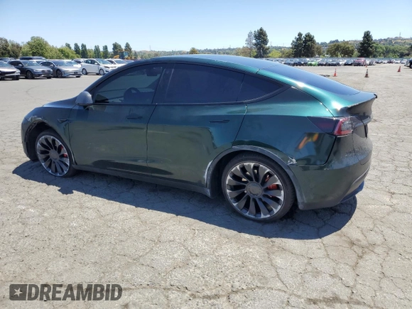 2022 Tesla Model Y Performance z VIN 7SAYGDEF2NF573979, wystawiony jako Copart lot #57778265 z przebiegiem 49 232 mil mil oraz Szkoda całkowita • Salvage title. Historia ofert i sprzedaży dostępna na DreamBid. Obrazek 2.