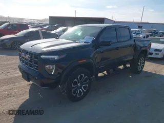 2024 GMC Canyon 4WD AT4 with VIN 1GTP6DEK9R1118926, listed as a IAAI auction lot 40998280 with 10,958 mi miles. Bid and sale history available at carsss.com. Image 2.