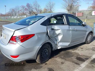 2013 Hyundai Accent GLS with VIN KMHCT4AE4DU477465, listed as a IAAI auction lot 41930256 with 48,877 mi miles and . Bid and sale history available at carsss.com. Image 6.