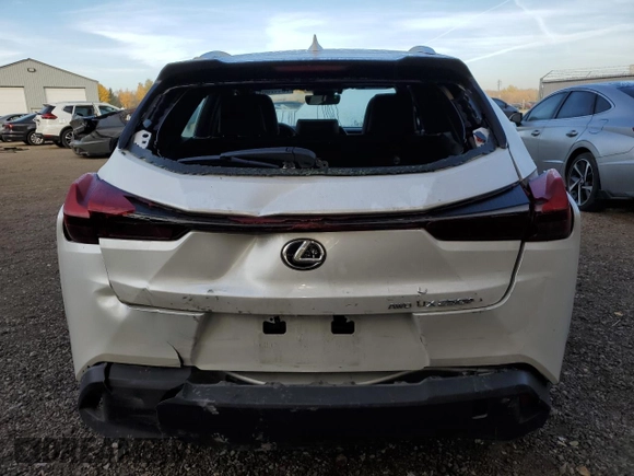 2024 Lexus UX 250h Premium with VIN JTHP9JBHXR2077083, listed as a Copart auction lot 76112004 with 22,385 mi miles and Salvage title. Bid and sale history available at DreamBid. Image 6.