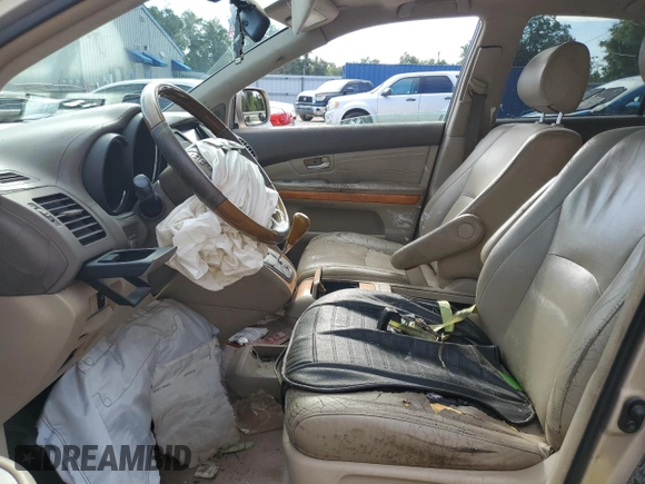 2006 Lexus RX 330 with VIN 2T2GA31U76C046515, listed as a Copart auction lot 63557655 with 302,374 mi miles and Salvage title. Bid and sale history available at DreamBid. Image 7.
