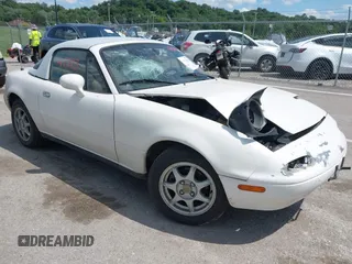 1996 Mazda MX-5 Miata with VIN JM1NA3538T0717273, listed as a IAAI auction lot 42541793 with 138,015 mi miles and . Bid and sale history available at DreamBid. Image 1.