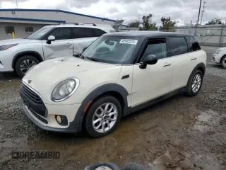 2016 MINI Clubman z VIN WMWLN5C58G2E30988, wystawiony jako Copart lot #48992025 z przebiegiem 108 620 mil mil oraz Tytuł czysty. Historia ofert i sprzedaży dostępna na DreamBid. Obrazek 1.