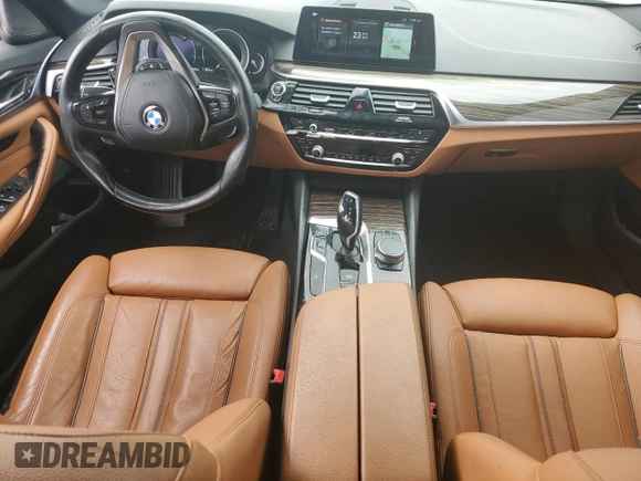 2018 BMW 5 Series 540i with VIN WBAJE5C54JWA93338, listed as a Copart auction lot 54312385 with 77,537 mi miles and Salvage title. Bid and sale history available at DreamBid. Image 8.