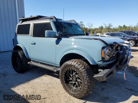 2021 Ford Bronco with VIN 1FMDE5CPXMLA63292, listed as a Copart auction lot 45659265 with 13,958 mi miles and Salvage title. Bid and sale history available at DreamBid. Image 4.
