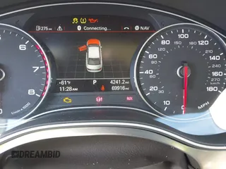 2014 Audi A6 Premium Plus z VIN WAUDFAFC7EN087684, wystawiony jako IAAI lot #41409408 z przebiegiem 69 916 mil mil oraz . Historia ofert i sprzedaży dostępna na DreamBid. Obrazek 16.