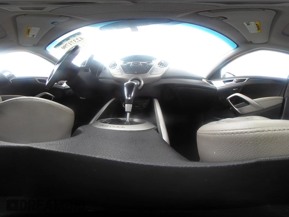 2012 Hyundai Veloster w/Gray Int with VIN KMHTC6AD4CU062034, listed as a IAAI auction lot 42371790 with 116,861 mi miles and . Bid and sale history available at DreamBid. Image 18.