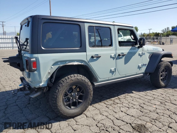 2024 Jeep Wrangler Sport S with VIN 1C4RJXN63RW142251, listed as a Copart auction lot 57103095 with 30,111 mi miles and Salvage title. Bid and sale history available at DreamBid. Image 3.