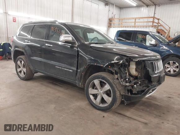 2014 Jeep Grand Cherokee Overland with VIN 1C4RJFCG8EC177899, listed as a IAAI auction lot 41695290 with 200,867 mi miles and . Bid and sale history available at DreamBid. Image 1.