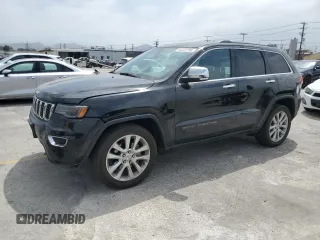 2017 Jeep Grand Cherokee Limited with VIN 1C4RJEBG1HC888425, listed as a Copart auction lot 60322295 with 121,527 mi miles and Salvage title. Bid and sale history available at DreamBid. Image 1.