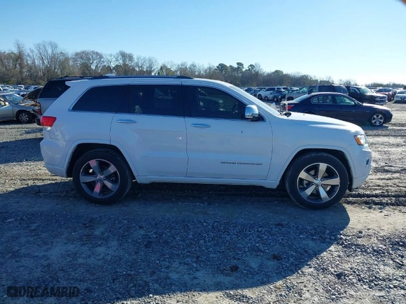 2014 Jeep Grand Cherokee Overland with VIN 1C4RJFCG9EC587322, listed as a IAAI auction lot 41632299 with 161,779 mi miles. Bid and sale history available at carsss.com. Image 13.
