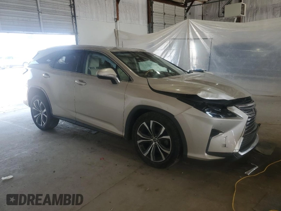 2019 Lexus RX 350L Premium with VIN JTJDZKCA0K2020664, listed as a Copart auction lot 52395325 with 95,942 mi miles and Salvage title. Bid and sale history available at DreamBid. Image 4.