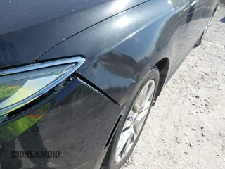 2013 Lincoln MKZ Hybrid z VIN 3LN6L2LU8DR821781, wystawiony jako IAAI lot #41892507 z przebiegiem 95 600 mil mil oraz . Historia ofert i sprzedaży dostępna na DreamBid. Obrazek 13.
