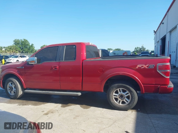 2010 Ford F-150 XL with VIN 1FTEX1C89AKE42323, listed as a IAAI auction lot 42047351 with 154,084 mi miles. Bid and sale history available at carsss.com. Image 14.