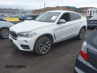 2015 BMW X6 xDrive35i with VIN 5UXKU2C57F0N77194, listed as a IAAI auction lot 41818860 with 105,579 mi miles and . Bid and sale history available at DreamBid. Image 18.