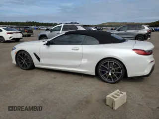 2019 BMW 8 Series M850i xDrive with VIN WBAFY4C54KBX29575, listed as a Copart auction lot 71558594 with 37,627 mi miles and Salvage Title. Bid and sale history available at carsss.com. Image 2.