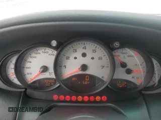 1999 Porsche 911 z VIN WP0AA2994XS625367, wystawiony jako Copart lot #51925145 z przebiegiem 70 486 mil mil oraz Szkoda całkowita • Salvage title. Historia ofert i sprzedaży dostępna na DreamBid. Obrazek 9.