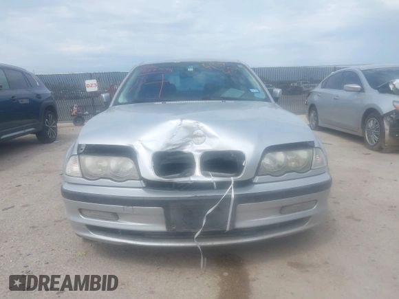 2001 BMW 3 Series 330i with VIN WBAAV53441JR78432, listed as a IAAI auction lot 41875391 with 105,050 mi miles. Bid and sale history available at carsss.com. Image 12.