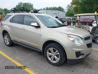 2015 Chevrolet Equinox LT z VIN 1GNFLFEK5FZ136280, wystawiony jako IAAI lot #42475823 z przebiegiem 151 322 mil mil oraz . Historia ofert i sprzedaży dostępna na DreamBid. Obrazek 1.