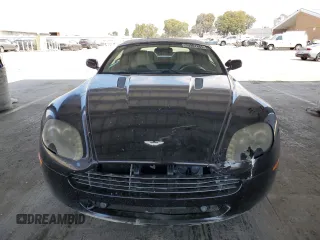 2009 Aston Martin Vantage z VIN SCFBF04CX9GD11858, wystawiony jako Copart lot #53907885 z przebiegiem 87 495 mil mil oraz Szkody całkowita. Historia ofert i sprzedaży dostępna na DreamBid. Obrazek 5.