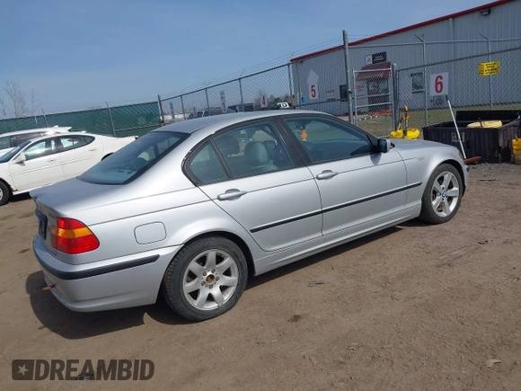 2003 BMW 3 Series 325i with VIN WBAET374X3NJ28919, listed as a IAAI auction lot 41809037 with 186,755 mi miles and . Bid and sale history available at DreamBid. Image 4.