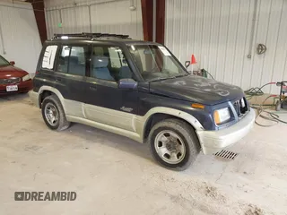 1997 Suzuki Sidekick z VIN JS3TD21V6V4105151, wystawiony jako IAAI lot #41805371 z przebiegiem 126 588 mil mil oraz . Historia ofert i sprzedaży dostępna na DreamBid. Obrazek 1.