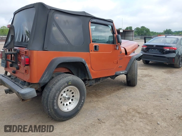 2001 Jeep Wrangler Sport z VIN 1J4FA49S01P341940, wystawiony jako IAAI lot #42542715 z przebiegiem 87 651 mil mil oraz . Historia ofert i sprzedaży dostępna na DreamBid. Obrazek 4.