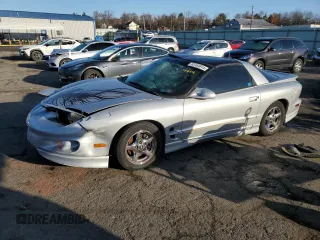 2000 Pontiac Firebird Firebird z VIN 2G2FS22K3Y2159513, wystawiony jako Copart lot #85164814 z przebiegiem 187 188 mil mil oraz Szkoda całkowita • Salvage title. Historia ofert i sprzedaży dostępna na DreamBid. Obrazek 1.