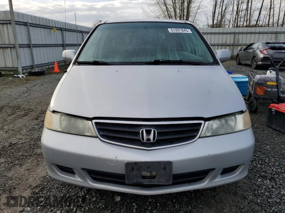 2002 Honda Odyssey EX z VIN 2HKRL18692H578746, wystawiony jako Copart lot #51281845 z przebiegiem 282 844 mil mil oraz Szkoda całkowita • Salvage title. Historia ofert i sprzedaży dostępna na DreamBid. Obrazek 5.