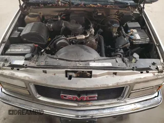 1999 GMC Suburban z VIN 3GKFK16R4XG540882, wystawiony jako Copart lot #80780884 z przebiegiem 209 819 mil mil oraz Czysty tytuł • Clean title. Historia ofert i sprzedaży dostępna na DreamBid. Obrazek 12.