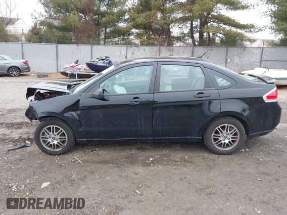 2011 Ford Focus SE with VIN 1FAHP3FN6BW140790, listed as a IAAI auction lot 41277430 with 114,192 mi miles. Bid and sale history available at carsss.com. Image 14.