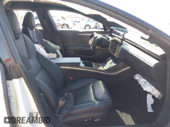2023 Tesla Model S with VIN 5YJSA1E59PF500816, listed as a IAAI auction lot 42409049 with Not provided miles and . Bid and sale history available at DreamBid. Image 5.