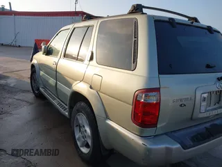 2001 Infiniti QX4 Luxury z VIN JNRDR07XX1W101118, wystawiony jako IAAI lot #41798112 z przebiegiem 184 082 mil mil oraz . Historia ofert i sprzedaży dostępna na DreamBid. Obrazek 3.