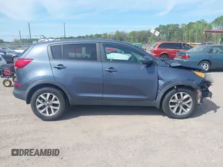 2015 Kia Sportage LX with VIN KNDPB3AC9F7757711, listed as a IAAI auction lot 41759749 with 179,111 mi miles and . Bid and sale history available at DreamBid. Image 13.