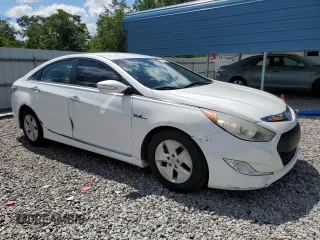 2012 Hyundai Sonata Hybrid z VIN KMHEC4A43CA059186, wystawiony jako Copart lot #55575405 z przebiegiem 217 801 mil mil oraz Szkoda całkowita • Salvage title. Historia ofert i sprzedaży dostępna na DreamBid. Obrazek 4.