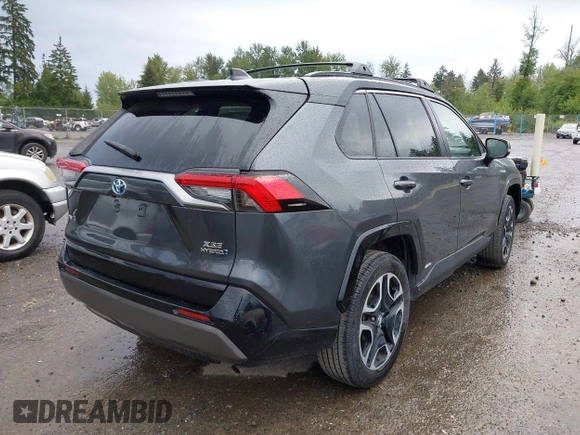 2021 Toyota RAV4 Hybrid XSE with VIN 2T3E6RFV4MW004081, listed as a IAAI auction lot 42300195 with 63,238 mi miles and . Bid and sale history available at DreamBid. Image 4.