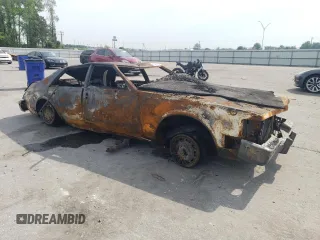 1985 Cadillac Seville z VIN 1G6KS6988FE825863, wystawiony jako Copart lot #52723115 z przebiegiem Nie podano mil oraz Szkoda całkowita • Salvage title. Historia ofert i sprzedaży dostępna na DreamBid. Obrazek 4.