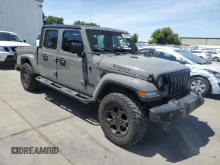 2023 Jeep Gladiator Sport S с VIN 1C6HJTAG3PL552959, выставлен на аукционе Copart как лот 56905635 с пробегом 30 356 миль миль и Списание • Salvage title. История ставок и продаж доступна на DreamBid. Изображение 4.