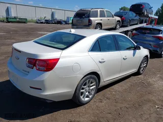2013 Chevrolet Malibu ECO with VIN 1G11F5RR3DF107590, listed as a IAAI auction lot 40051912 with 150,179 mi miles. Bid and sale history available at carsss.com. Image 4.